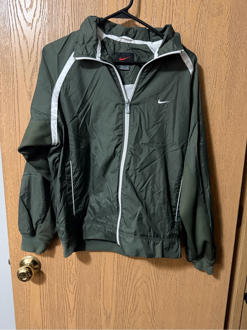 Nike women’s Dark Olive Green Windbreaker with White Trim